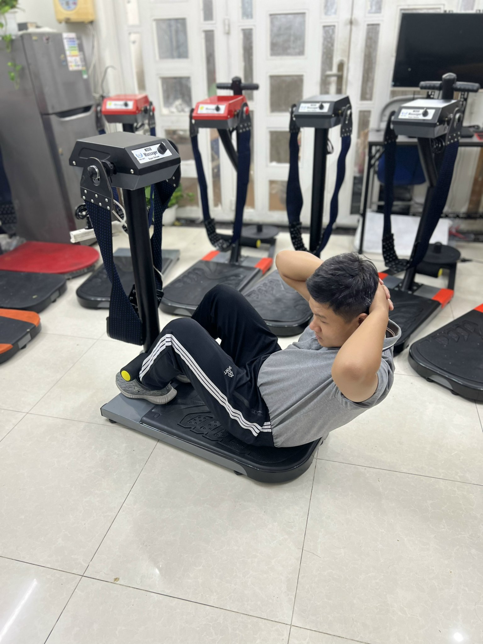 Máy mát xa tan mỡ bụng đứng có hại cho sức khỏe không ?